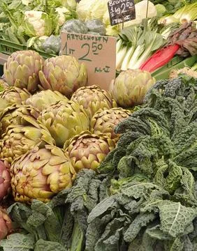 Different types of vegetables displayed in the Vienna Naschmarkt street marke Stock Photos