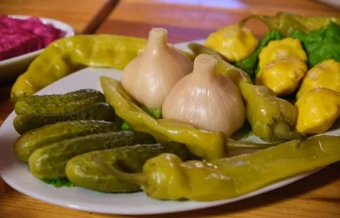 Different types of vegetables on white plate. Stock Photos