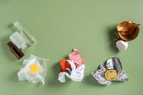 Different types waste, garbage of plastic, metal, organic, paper, glass on .. Stock Photos