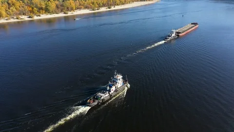 Different types of water transport float down the river. Stock Footage 122427223