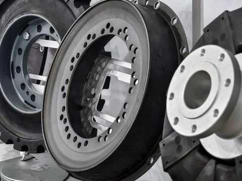 Different types of wheels displayed in a workshop showcasing their design a.. Stock Photos