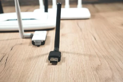 Different types of Wi-Fi routers, modern and old technology. Wireless ether.. Stock Photos