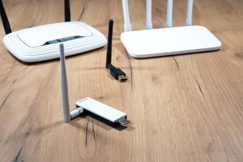 Different types of Wi-Fi routers, modern and old technology. Wireless ether.. Stock Photos