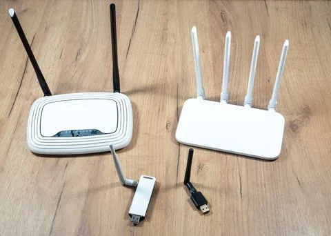 Different types of Wi-Fi routers, modern and old technology. Wireless ether.. Stock Photos