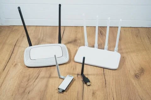 Different types of Wi-Fi routers, modern and old technology. Wireless ether.. Stock Photos