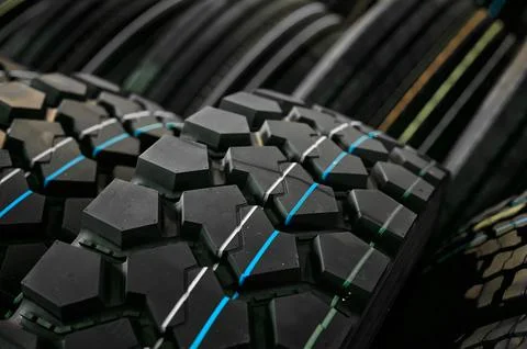 Different tyres with marking lines after vulcanization Stock Photos