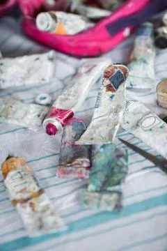 Different used tubes with paints Stockfoto's