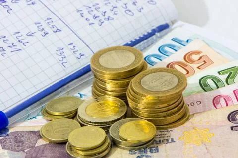 Different values of the paper bills and coins of turkish liras Stock Photos