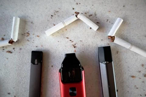 Different vape devices electronic cigarettes as smoking alternatives with bro Stock Photos