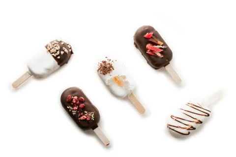 Different variants of cake popsice creams on white background Stock-Fotos