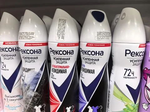Different varieties of deodorant showcasing vibrant packaging in a store Stock Photos