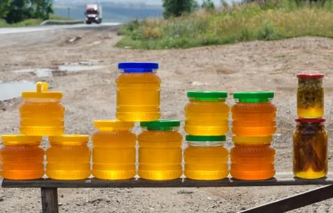 Different varieties of honey in jars Stockfoto's