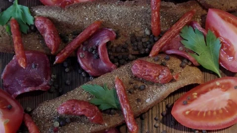 Different varieties of sausages and chips from rye bread, Stock Footage 170757701
