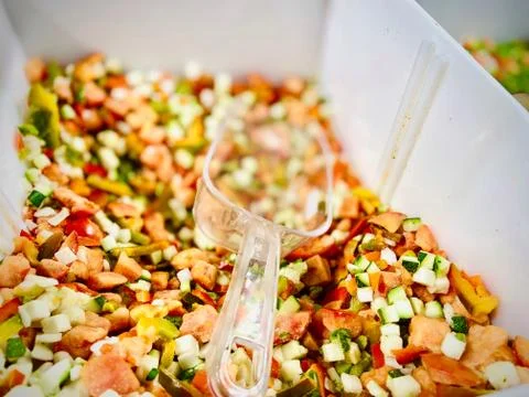 Different vegetable mixtures in the container. Mobile photo. A close-up. Supe Stock-Fotos