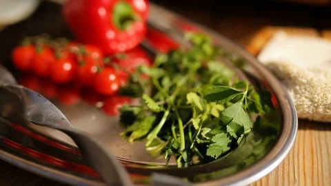 Different vegetables - bell peppers, cucumbers, tomatoes and herbs Stock Footage 89273081