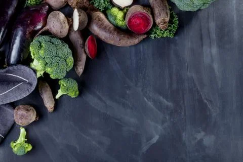 Different vegetables on black Stock Photos