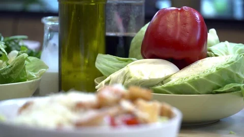 Different vegetables in the bowl on the table Stock Footage