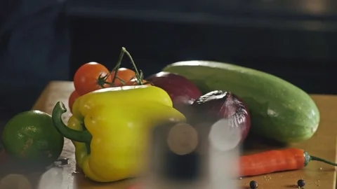 Different vegetables, ingredients for the salad are on the carving board Stock Footage 73349106
