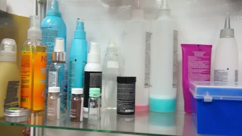 Different vials on the glass shelf Stock Footage 87447868