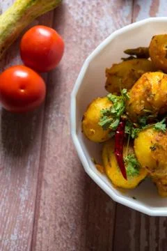 Different view of dum aloo or cooked potatoes Indian style Stock Photos