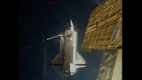Different views of STS-74 Mir Shuttle docking - 1995 Stock Footage 94383224