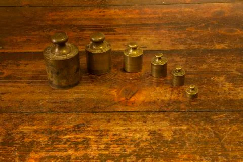 Different vintage brass weights unit Stock Photos