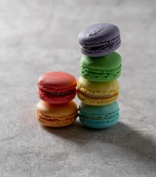 Differnt color macaroons on a marble background Stock Photos