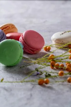 Differnt color macaroons on a marble background Stock Photos
