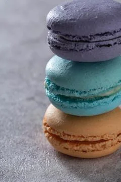 Differnt color macaroons on a marble background Stock Photos