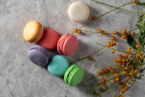 Differnt color macaroons on a marble background Stock Photos