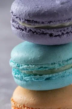 Differnt color macaroons on a marble background Stock Photos