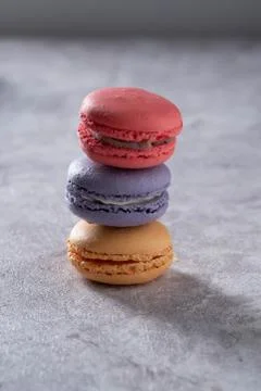 Differnt color macaroons on a marble background Stock Photos