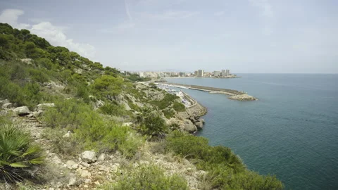Difficult ascent along the path of stones uphill Stock Footage 248823250