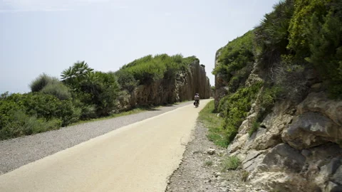Difficult ascent along the path of stones uphill Stock Footage 248824874