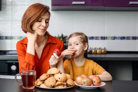 Difficult choice between healthy and unhealthy food during quarantine, isolation Stock Photos