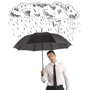 Difficulty in business with umbrella Stock Photos
