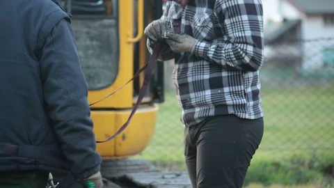 Difficulty to work with protective gloves Stock Footage 100395520