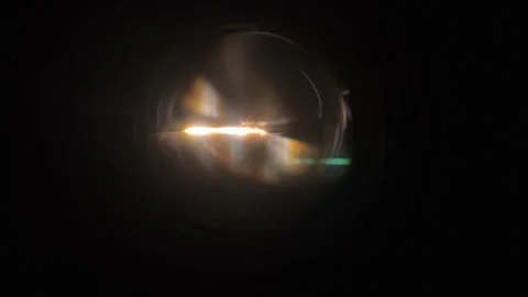 Diffraction of Light Through Slit Illuminating Darkness Stock Footage 267054860