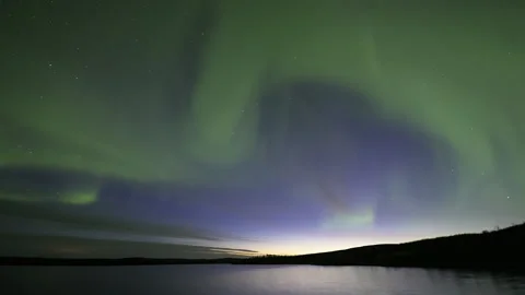 Diffuse aurora borealisover the lake Stock Footage 250295571