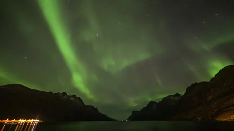 Diffuse aurora over the fjord Stock Footage 250451694