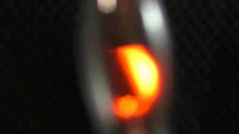 The diffuse glow of a gas discharge lamp is often used as a background. Video stock 109644759