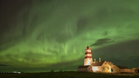 Diffuse Northern Lights with lighthouse tower Stock Footage 250795245