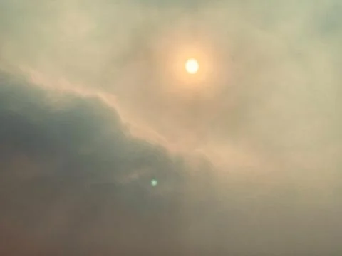 Diffused Sunlight Through Hazy Clouds Over Jakarta Stock Photos