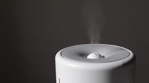 Diffuser, air purifier or humidifier releases strong stream of cold steam with Stock Footage 247155785