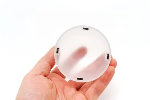 Diffuser attachment for camera flash tool in hand Stock Photos