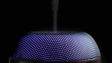 Diffuser for essential oils diffusing steam on black background Stock Footage 150910911