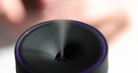 Diffuser spreads essential oils and humidifies air in room Stock Footage 238518921