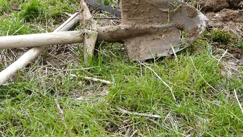 Dig garden soil, do garden in spring, render garden soil in spring Stock Footage 106818223