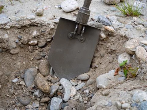 Dig a hole with a spade Stock Photos