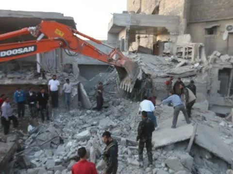 Digger at Bombing Aftermath Syria 스톡 동영상 12614482